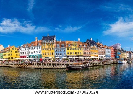 Nyhavn district is one of the most famous landmark in Copenhagen in a summer day, Denmark