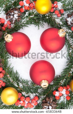 Christmas green  framework with snow  and holly berry  isolated on white background