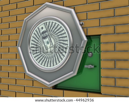 Green safe deposit in wall behind the picture
