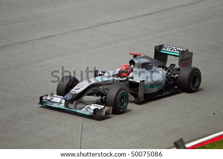 SEPANG, MALAYSIA - APRIL 2: German Michael Schumacher of Team Mercedes GP accelerates down the back straight at the Petronas Formula 1 Grand Prix April 2, 2010 in Sepang, Malaysia