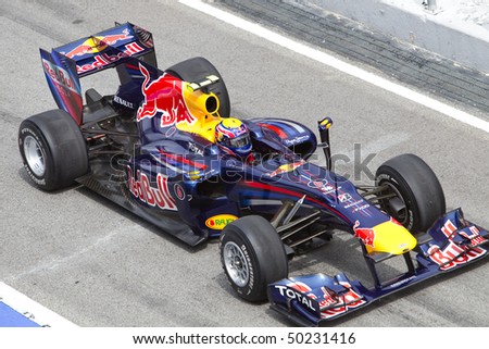 SEPANG, MALAYSIA - APRIL 4: Close up of Australian Mark Webber of Team Red Bull exiting the pit lane after a tyre change at the Petronas Formula 1 Grand Prix April 4, 2010 in Sepang, Malaysia