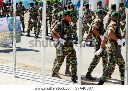 DILI, TIMOR LESTE - AUGUST 20: Timorian army marches during parade at Timor Leste National Army Day on August 20, 2010 in Dili, Timor Leste.