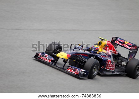 SEPANG, MALAYSIA - APRIL 8: Australian Mark Webber of Red Bull Racing at the back straight during Friday practice at Petronas Formula 1 Grand Prix on April 8, 2011 in Sepang, Malaysia