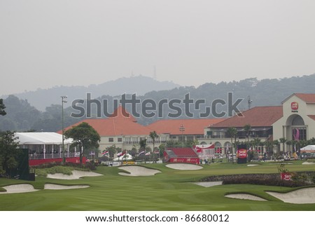 KUALA LUMPUR, MALAYSIA - OCTOBER 15: A view of the 18th hole and clubhouse after rain stopped play on Day 3 of Sime Darby LPGA Golf October 15, 2011 in Kuala Lumpur, Malaysia.