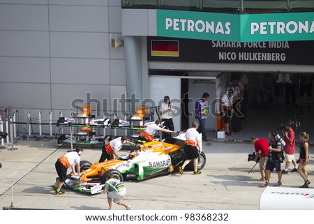 SEPANG, MALAYSIA - MARCH 23: German Nico Hulkenberg of Team Sahara Force India pushed back to pit after Friday practice at Petronas Formula 1 Grand Prix March 23, 2012 in Sepang, Malaysia