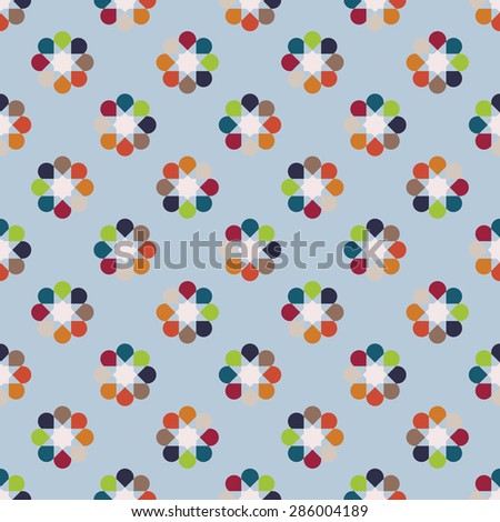 Rainbow seamless pattern of abstract flowers. Simple background. Round motif.
