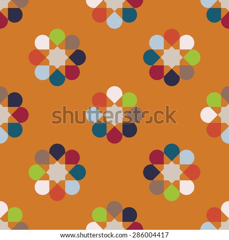 Rainbow seamless pattern of abstract flowers. Simple background. Round motif.