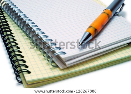 Ballpoint Pen on Notebooks Isolated on White