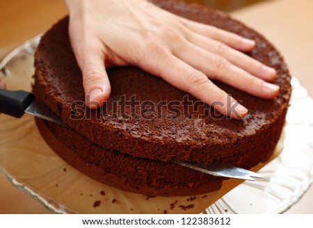 Cutting Cake on Layers. Making Chocolate Layer Cake. Series.