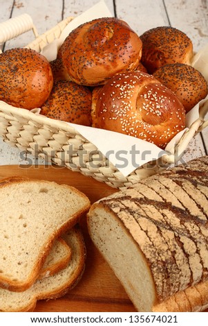 Bread Roll with Sesame Seed and Poppy Seed. Hard Roll. Kaiser Roll. Focus on Bread Rolls.