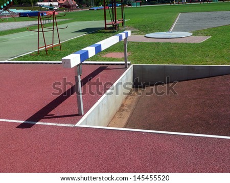 Running tracks with steeplechase barrier and water jump