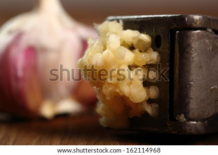 Garlic crushed and garlic press