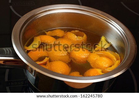 Simmer orange peel into syrup. Candied Orange Zest Cooking. Series.