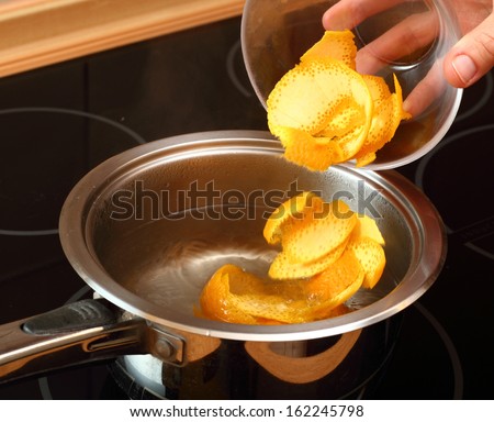 Add orange peel into saucepan with boiling syrup. Candied Orange Zest Cooking. Series.