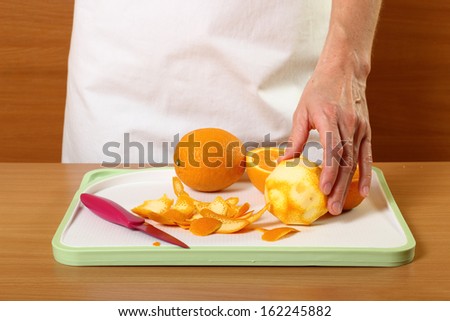 Peeling orange. Candied Orange Zest Cooking. Series.