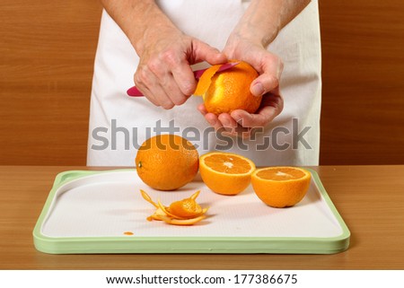 Peeling orange. Candied Orange Zest Cooking. Series.