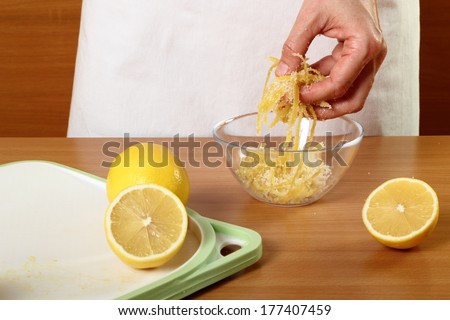 Coating lemon peels with sugar. Candied Lemon Zest Cooking. Series.