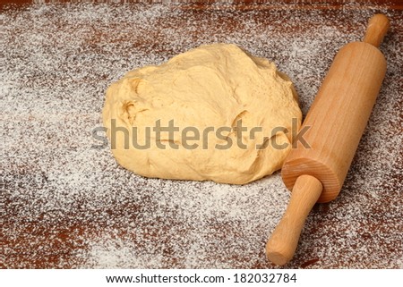 Yeast Raised Dough and Rolling Pin. Making Doughnuts