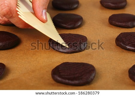 Decorating (making strips) surface. Making Chocolate Cookies.