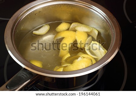 Simmer lemon peel into syrup. Candied Lemon Zest Cooking. Series.