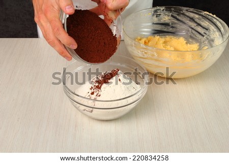 Add Cocoa Powder into Flour and Mixing. Making Chocolate Cookies.