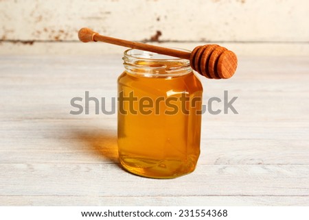 Jar of Honey with Honey Dipper