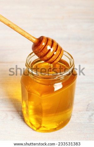 Jar of Honey with Honey Dipper