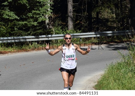 KRYNICA-ZDROJ, POLAND - SEPT 11: The runner Poreba Jacek is running a marathon (control point 39km) at Economic Forum Polish Running Festival September 11, 2011 in Krynica-Zdroj, Poland