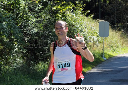 KRYNICA-ZDROJ, POLAND - SEPT 11: The runner Mastalerz Tomasz is running a marathon (control point 39km) at Economic Forum Polish Running Festival September 11, 2011 in Krynica-Zdroj, Poland