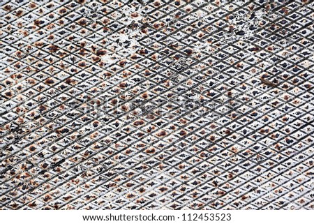 Abstract pattern of diamond shapes.