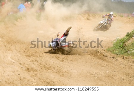 RUSSIA, MOSCOW-SEPTEMBER 8: fall athlete of the race Stage III Cup XSR-MOTO.RU Cross Country in Moscow, Sheremetyevo, route \