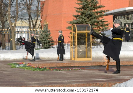 MOSCOW - FEBRUARY 23: Guard of Honor change at the tomb of the Unknown Soldier at the wall of Moscow Kremlin in the Defender\'s Day celebration Otechestvaon February 23, 2013 in Moscow, Russia.
