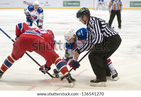 MOSCOW - FEBRUARY 20: Face-off in Hockey match CSKA-LEV PRAHA in sports palace CSKA on February 30, 2013 in Moscow, Russia