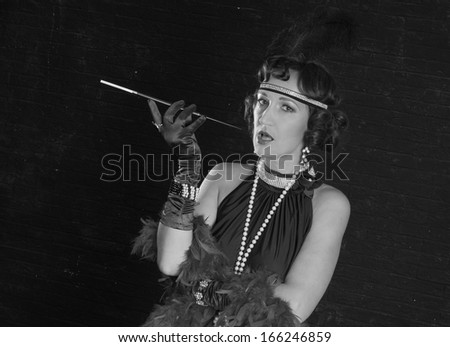 Retro Woman Portrait. Beautiful Woman with Mouthpiece. Cigarette