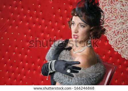 Retro Woman Portrait. Beautiful Woman. Old Fashioned 20's or 30's style.