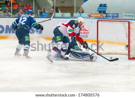 MOSCOW - JANUARY 28, 2014: Forward Miroslav Shatan (Slovan 18) scores during the KHL regular Hockey match Dynamo (Moscow) - Slovan (Bratislava) in sports palace Luzhniki. Final score 2:3
