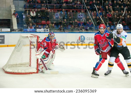 MOSCOW - DECEMBER 3: Unidentified hockey player on game CSKA vs Severstal on Russian KHL premier hockey league Championship on December 3, 2014, in Moscow, Russia. CSKA won 9:1