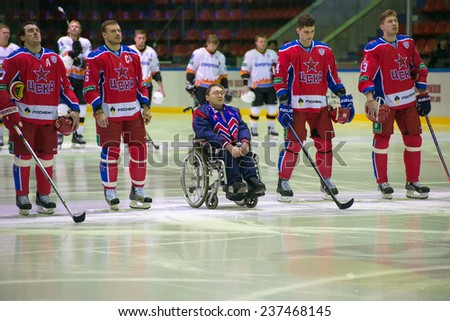 MOSCOW - DECEMBER 3: Unidentified hockey player and sports fans on game CSKA vs Severstal on Russian KHL premier hockey league Championship on December 3, 2014, in Moscow, Russia. CSKA won 9:1