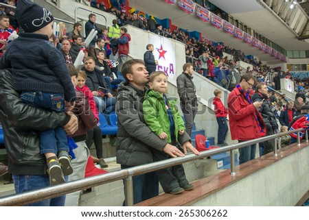 MOSCOW - MARCH 12: Unidentified fans during a break on hockey game CSKA vs Yokerit   on Russia KHL championship on March 12, 2015, in Moscow, Russia. CSKA won 3: 2