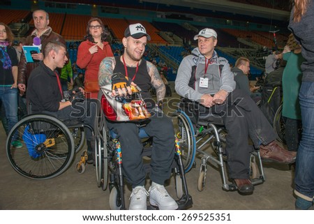 MOSCOW - MARCH 13: participants of the International Social and charitable project MOTOTERAPIA for people with disabilities on March 13, 2015, in Moscow, Russia. Sports Complex Olimpiyskiy