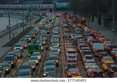 MOSCOW, RUSSIA-APRIL 9, 2015: Cars stands in traffic jam on the city center, Moscow Russia. Moscow Mayor Sobyanin reconstructs suburban railways, to solve problem of traffic jams in 2016.