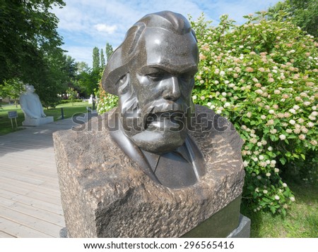 MOSCOW, RUSSIA - JUNE 17, 2015: Portrait of Karl Marx sculpture in Muzeon Art Park in Moscow, Russia. Sculptor Merkulov, circa 1938, a granite