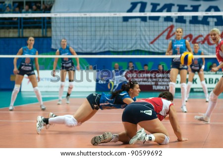 MOSCOW, RUSSIA - DECEMBER 8: Unidentified players in action a European League woman's volleyball game Dynamo Russia (blue) vs Bank BPS Mushin Poland (red) on December 8, 2011 in Moscow, Russia.