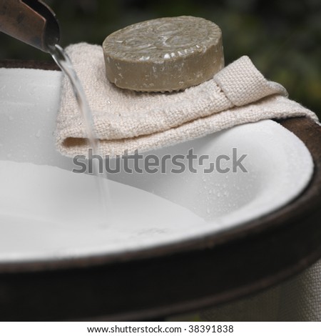 Towel and soap in the wash basin