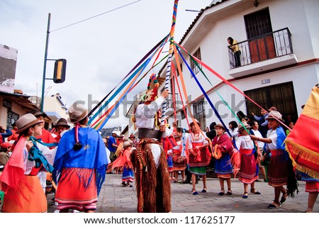 PUJILI, ECUADOR - 25 JUNE : indigenous group dancing around pole in traditional costume, Inti Raymi festivities, 25 June 2011 PUJILI, ECUADOR
