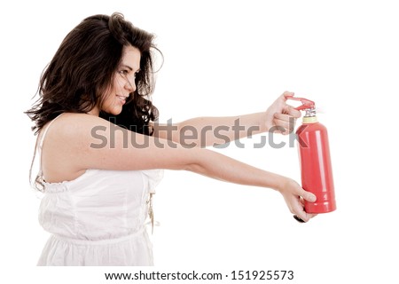 Business woman in holding fire extinguisher