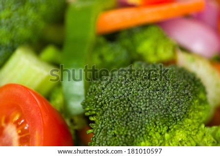 Fresh broccoli salad with lettuce, broccoli and tomato