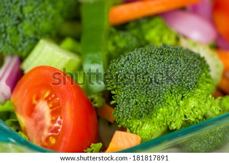 Fresh broccoli salad with lettuce, broccoli and tomato