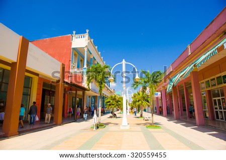CIEGO DE AVILA, CUBA - SEPTEMBER 5, 2015: Walking boulevard with stores in Downtown of Ciego de Avila.  The city has a population of about 86,100.
