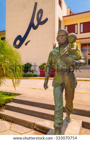 SANTA CLARA, CUBA - SEPTEMBER 5, 2015: Che Guevara statue or monument outside the Communist Party Headquarters in the city. The monument was designed by Jose Delarra, nowadays is a tourist landmark.